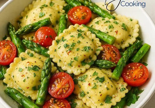 Ravioli with asparagus and cherry tomatoes.