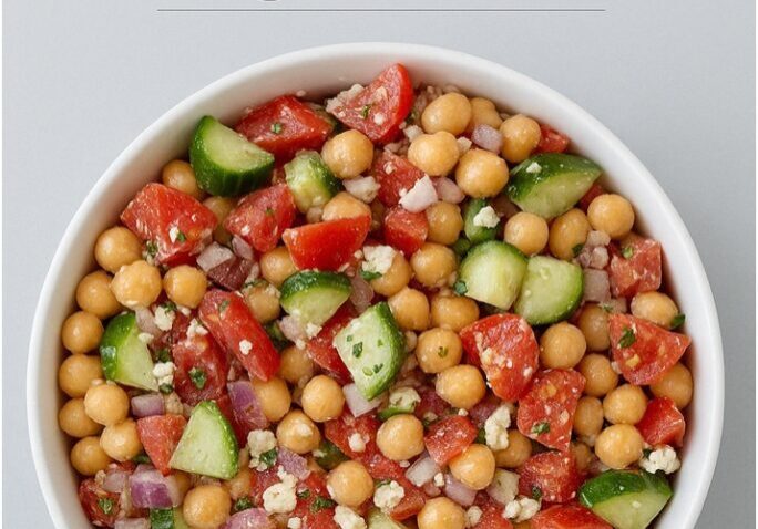 Chickpea salad in white bowl, Neighbors Cooking.