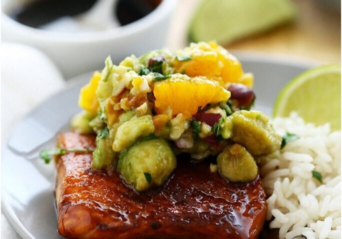Grilled salmon with fruit salsa and rice.